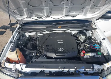 2012 Toyota Tacoma Base V6 z USA, uszkodzony, nr VIN 3TMLU4EN3CM100527